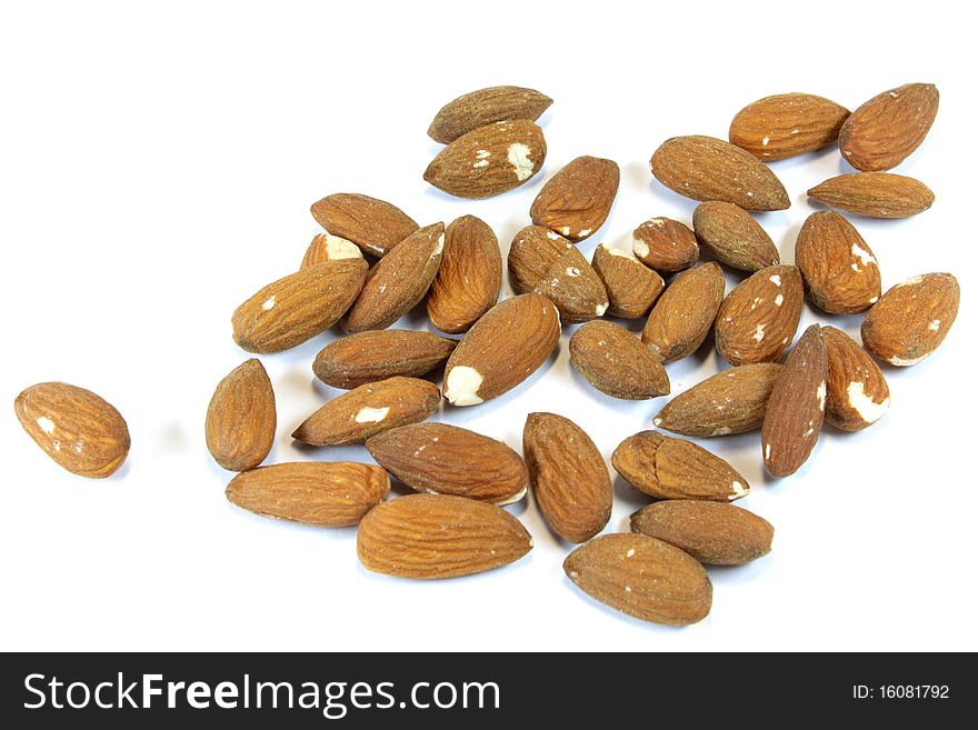 Almonds handful on a white background