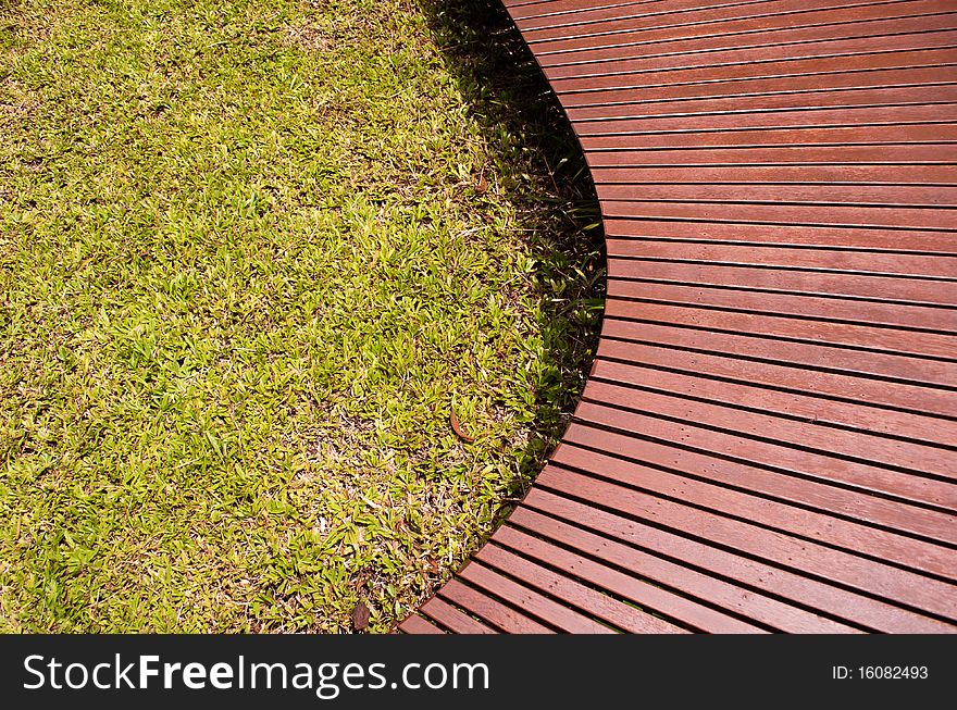 A simple architectural curve on green grass. A simple architectural curve on green grass