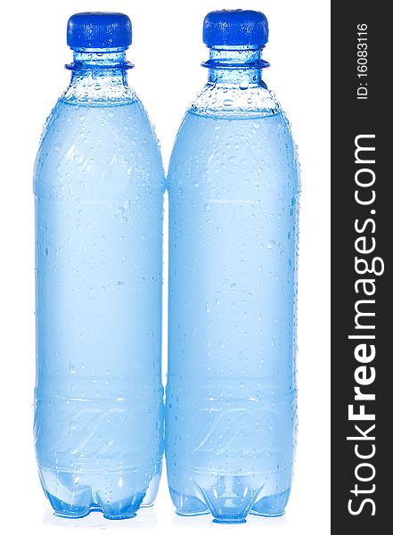 Plastic bottles with water drops