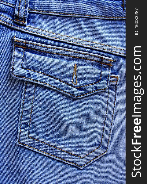 Blue jeans pocket close up