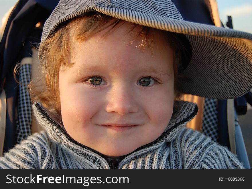 Outdoor portrait of a smiling child. Outdoor portrait of a smiling child