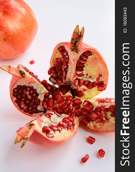 Red pomegranate fruit on the table