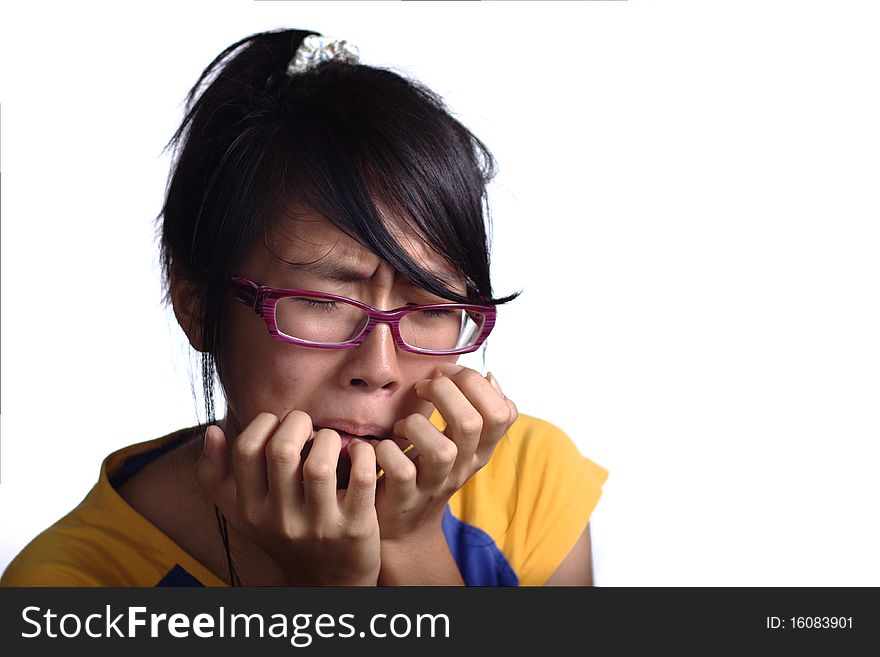 Sobbing asian female teenager with white background. Horizontal view with copyspace. Sobbing asian female teenager with white background. Horizontal view with copyspace.