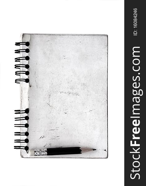 Dirty old spiral notepad and pencil on isolated on white