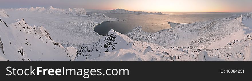 Winter Arctic landscape, panorama at the sunset