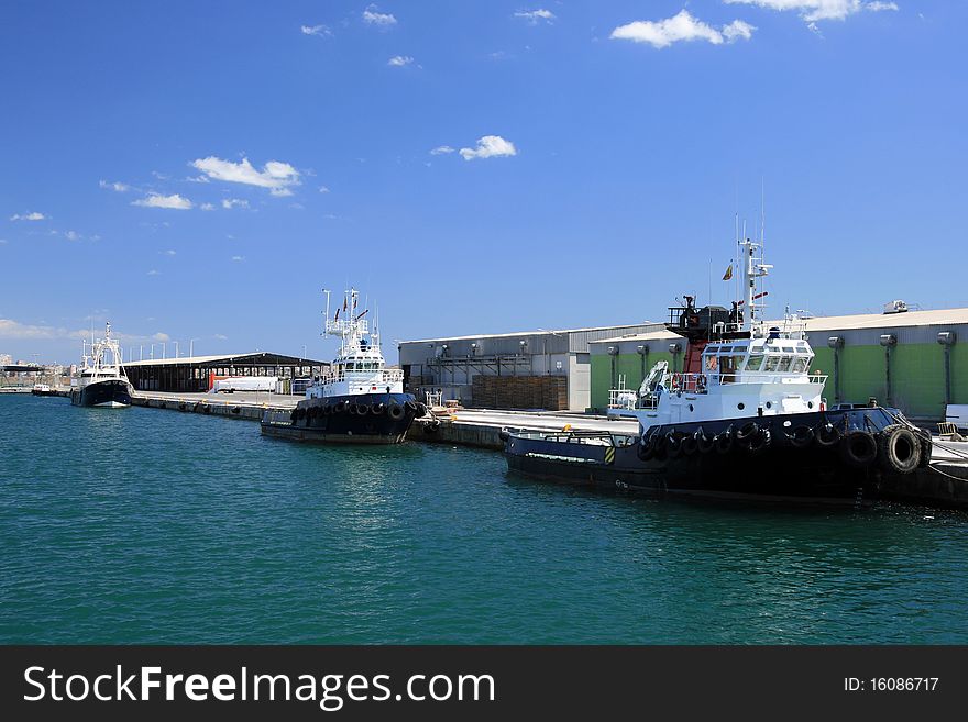 Tugs tied up in the port of Alicante