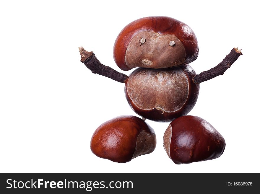 Little manikin made of chestnuts. Little manikin made of chestnuts