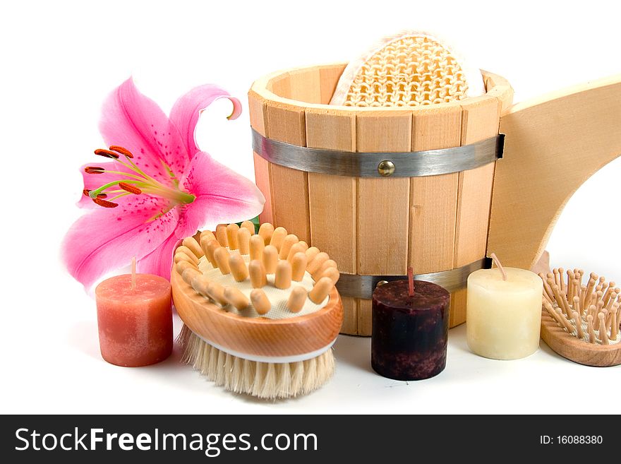 Washtub with candles and flower isolated on a white background