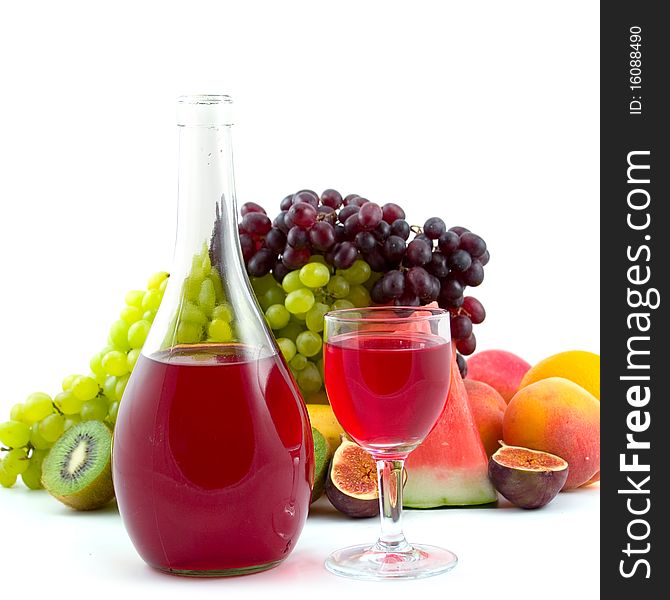 Bottle of wine, glass and fruits isolated on white