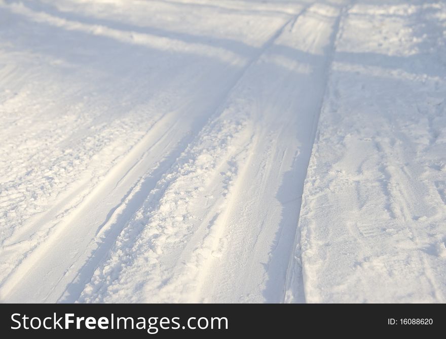 Ski track in winter, low point of view