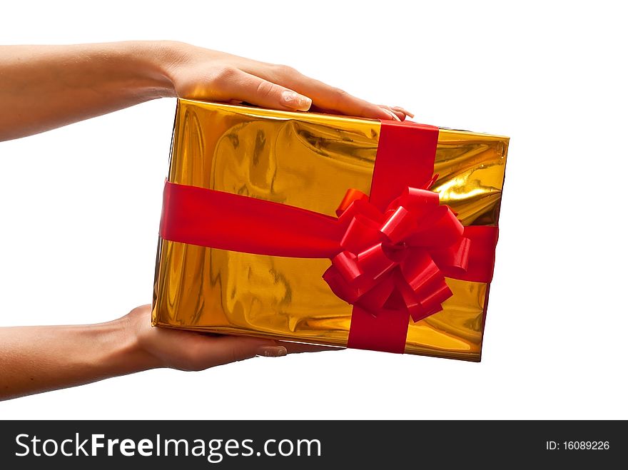 Yellow gift box in woman s hand