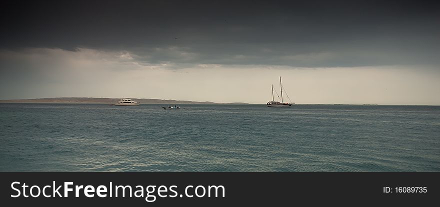 Moody skies over the sea. Moody skies over the sea.