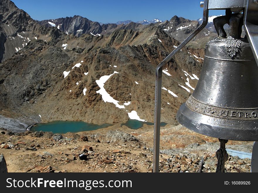 Bell on the top. Bell at 3140 meters on the sea-level, in Vallumbrina, Brixia province, Lombardy region, Italy