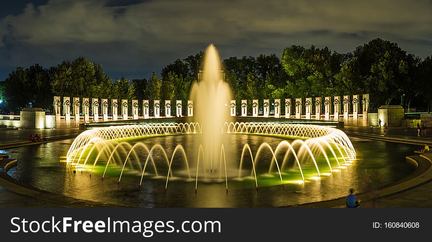 Night time panorama of the World Word II Memorial with its fountain lit up