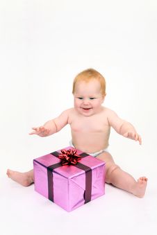 The Child Rejoicing To A Gift Royalty Free Stock Image