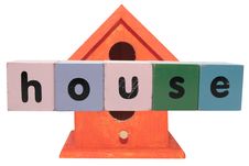 Birdhouse In Toy Blocks On White Stock Image