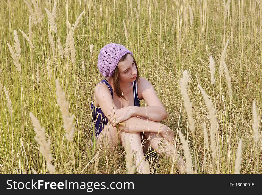 Lonely girl longs in the field. Lonely girl longs in the field.