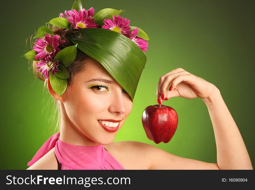 Beautiful spring-woman with red apple. Beautiful spring-woman with red apple