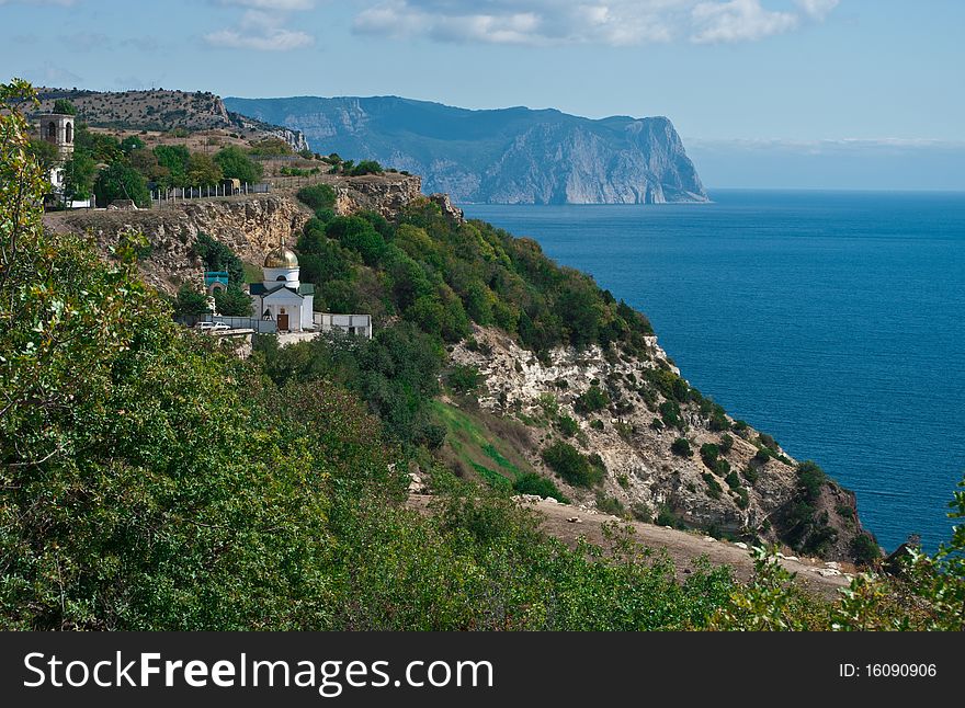 The view of sea coast in Sebastopol, Ukraine with the orthodox monastery on it. The view of sea coast in Sebastopol, Ukraine with the orthodox monastery on it
