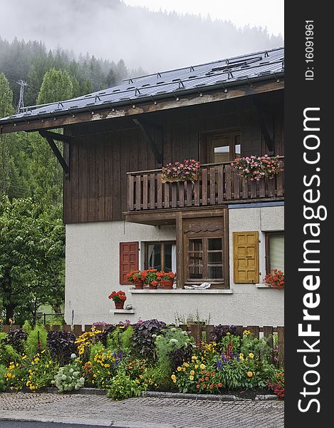 This image shows a view of a typical chalet in the Alps, in the village of Le Praz. This image shows a view of a typical chalet in the Alps, in the village of Le Praz