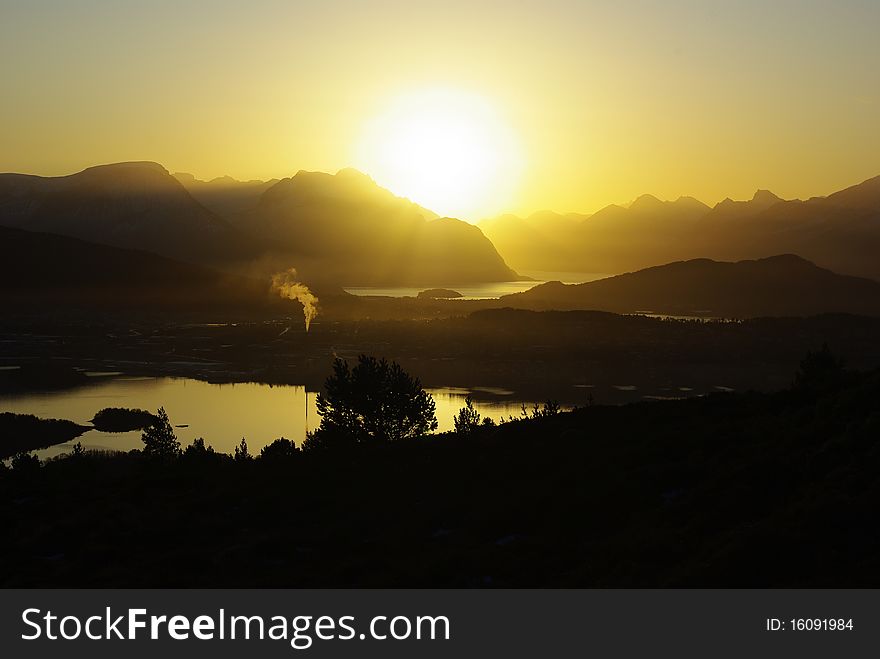 Fjord   yellow sky sun 
water  outdor Mountains nature 
norway norvegian. Fjord   yellow sky sun 
water  outdor Mountains nature 
norway norvegian