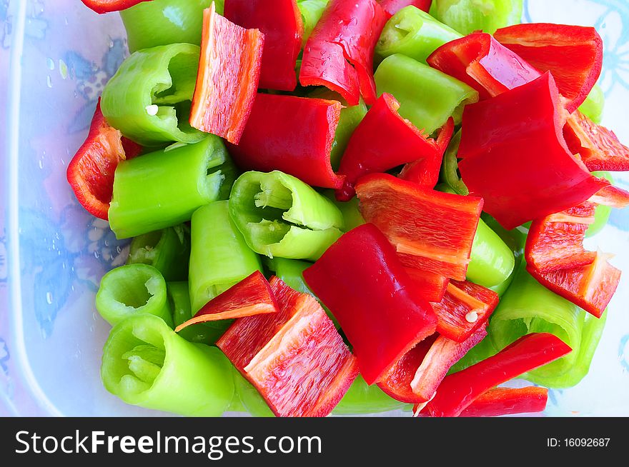 Closeup photo of chopped red and green peppers. Closeup photo of chopped red and green peppers