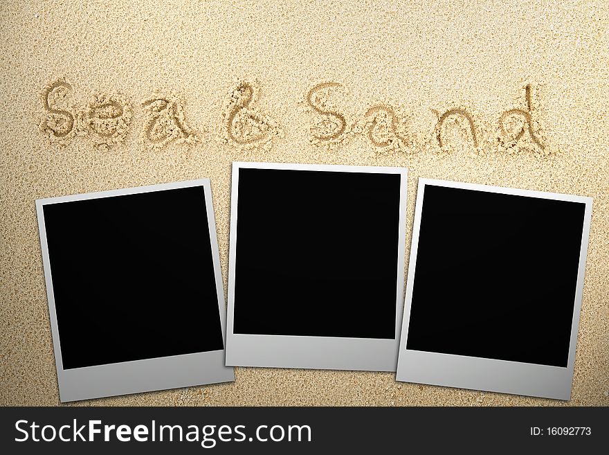 Aged photo frame on sand background