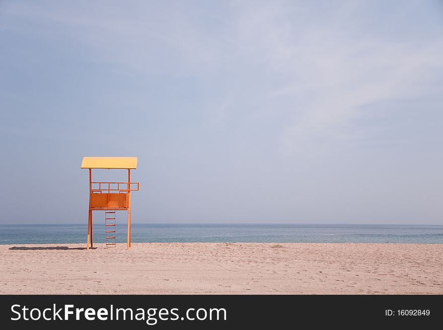 Lifeguard baywatch tower hut on a beach in Costinesti, Romania, Black Sea seashore.