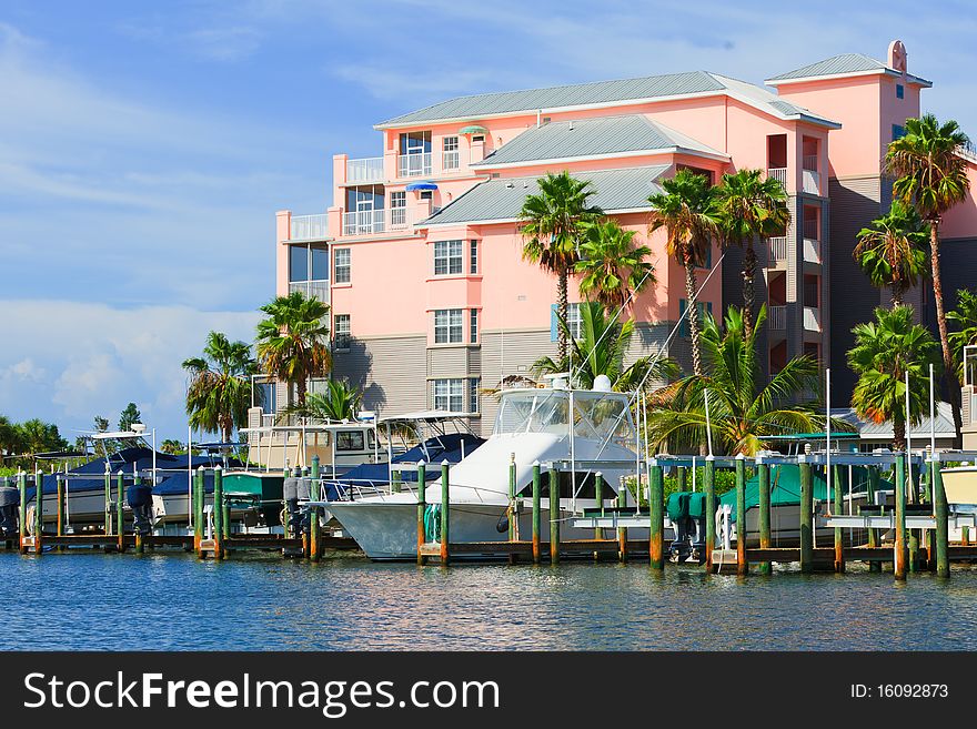 Yacht - Fishing Boat on the waterfront of colorful homes