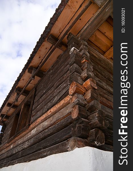 Old traditional wood house, romanian traditional architectural style, life in the countryside.