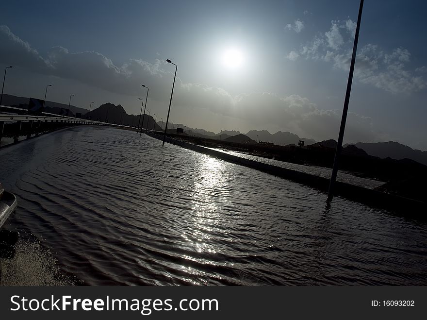 Flooded road after heavy rainfall. Sharm el Sheikh, Red Sea, Egypt. Flooded road after heavy rainfall. Sharm el Sheikh, Red Sea, Egypt.