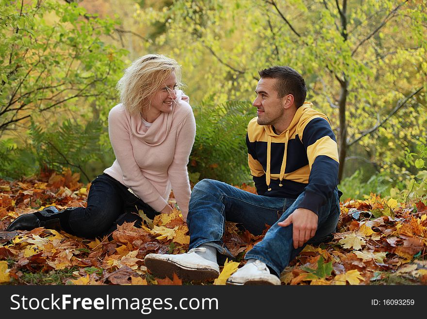 Beautiful couple having fun in autumn park. Beautiful couple having fun in autumn park