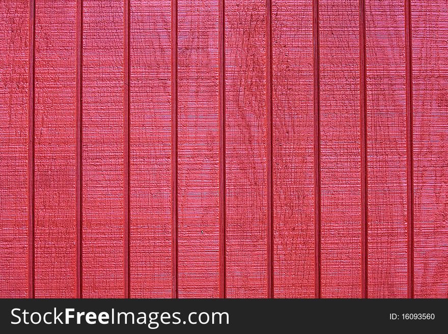 Texture of a red wooden wall.