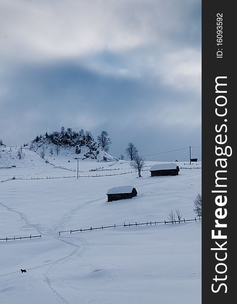 Houses on Mountain, in Winter Landscape