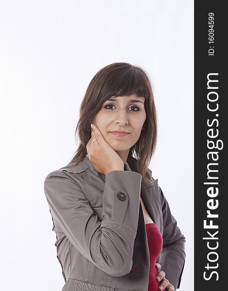 This photo shows a beautifull young girl doing poses on a white background.