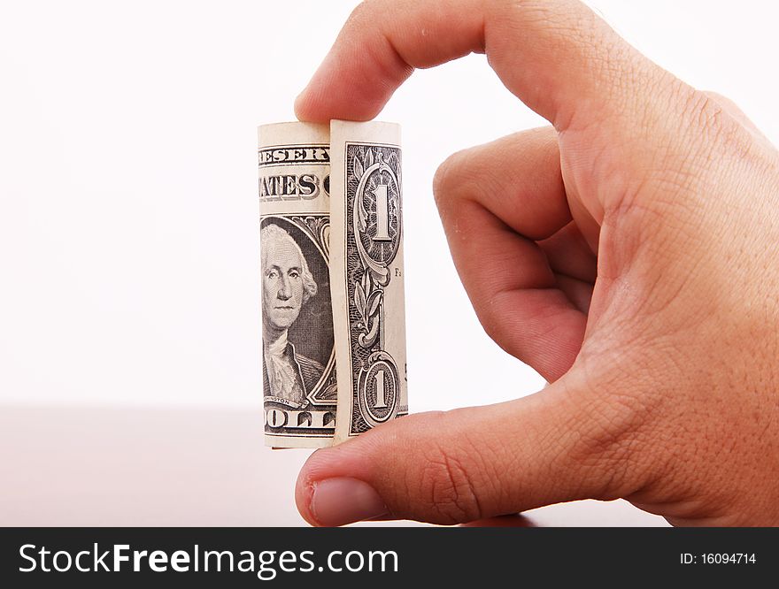 Hand with one dollar roll on white background, Money image. Hand with one dollar roll on white background, Money image