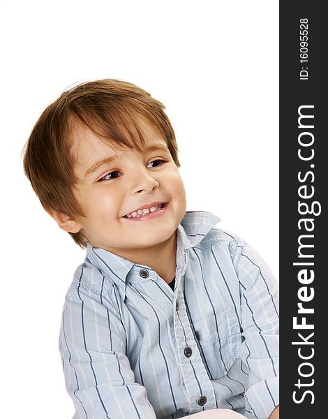 Portrait of little cute joyful boy in blue shirt on white background. Portrait of little cute joyful boy in blue shirt on white background