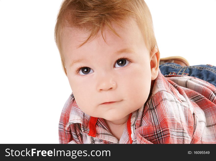 Close-up portrait of pretty baby with attentive look isolated on white background