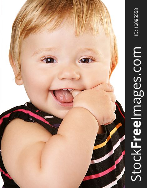 Portrait of happy laughing cute baby holding finger in mouth isolated on white background. Portrait of happy laughing cute baby holding finger in mouth isolated on white background