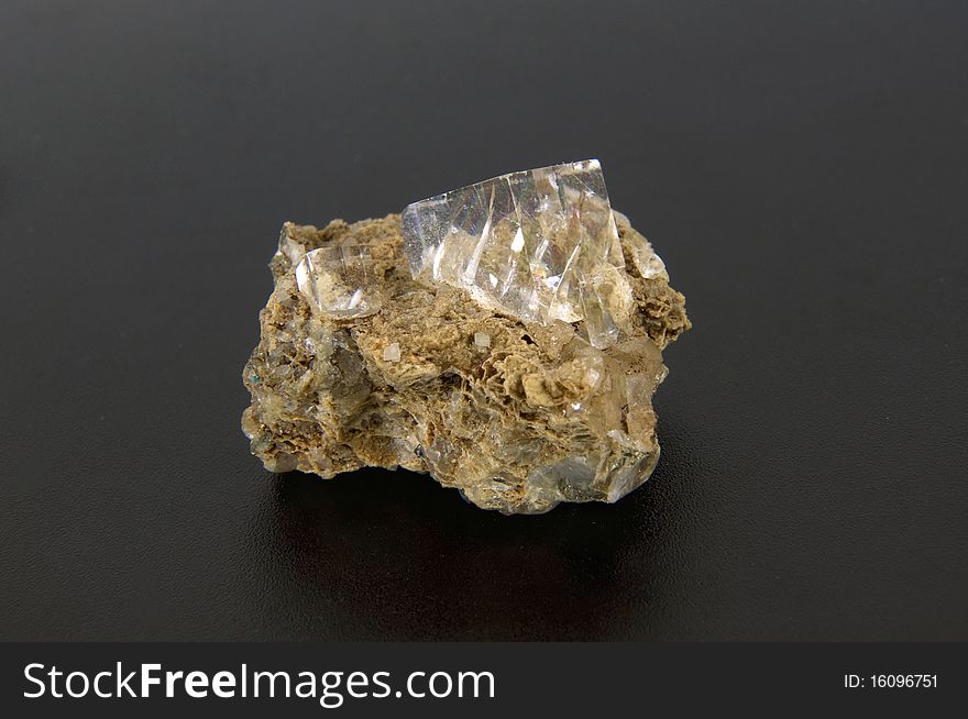 Large calcite crystals on a gray background