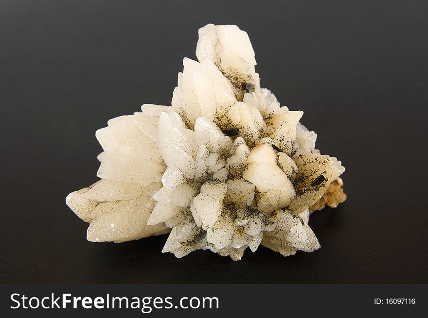 Large calcite crystals on a gray background