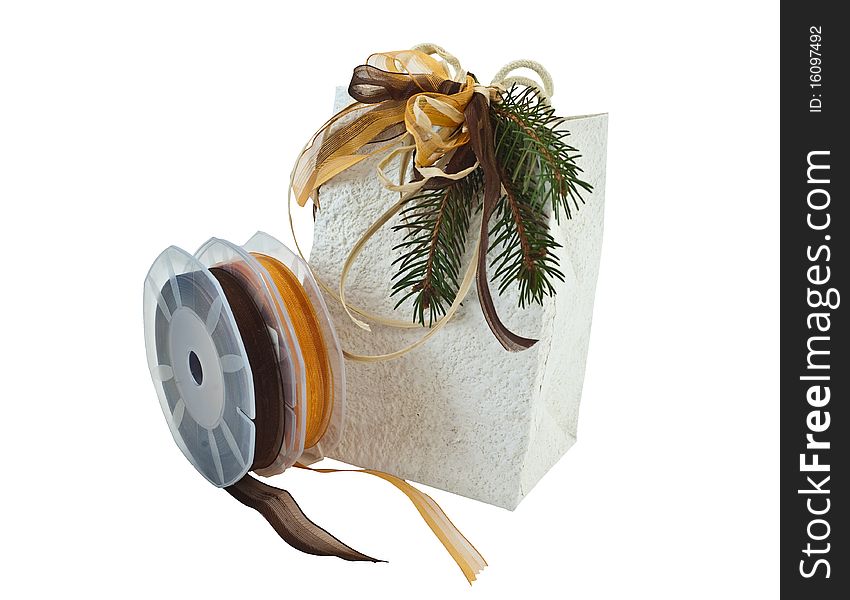 Christmas Package and colored ribbons on a white background. Christmas Package and colored ribbons on a white background