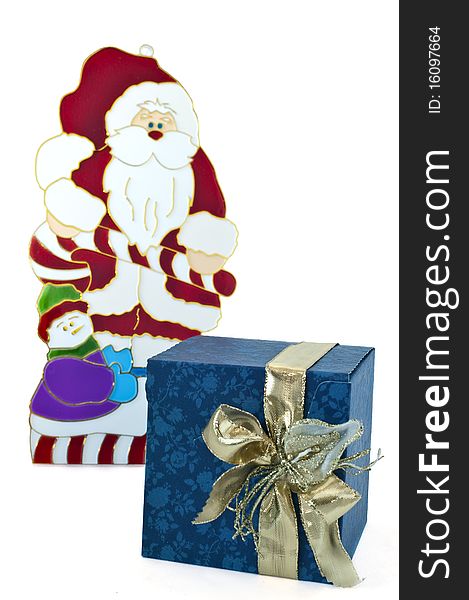 Package Christmas and Santa Claus blurred background. Package Christmas and Santa Claus blurred background