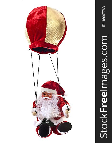 Santa Claus in a hot-air balloon on a white background