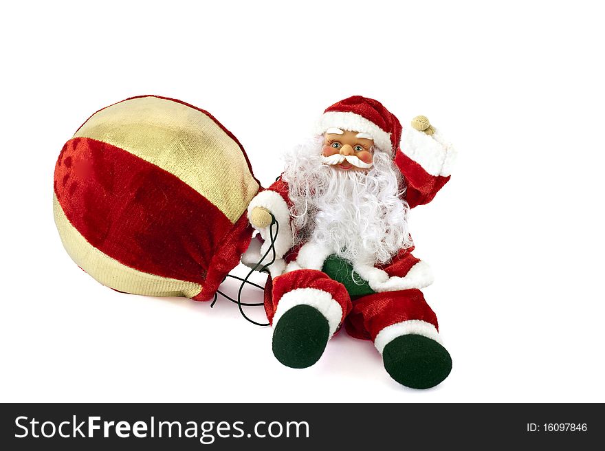 Santa Claus doll with balloon on a white background. Santa Claus doll with balloon on a white background