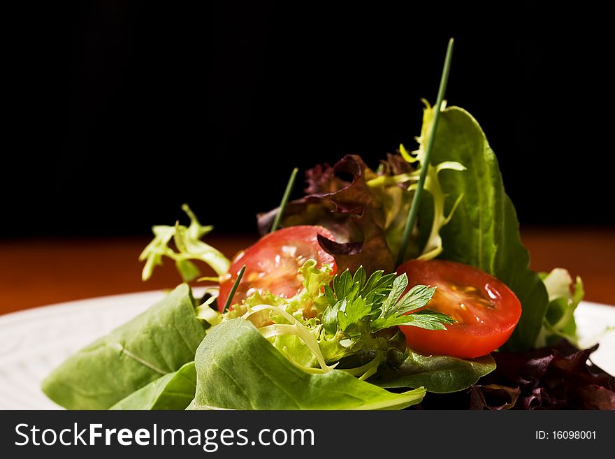 Salad of Mixed Baby Greens with Tomatoes. Salad of Mixed Baby Greens with Tomatoes