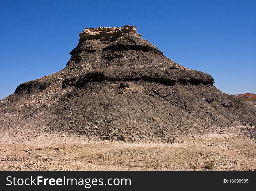 A random rock formation in the Bisti Badland wilderness. A random rock formation in the Bisti Badland wilderness.