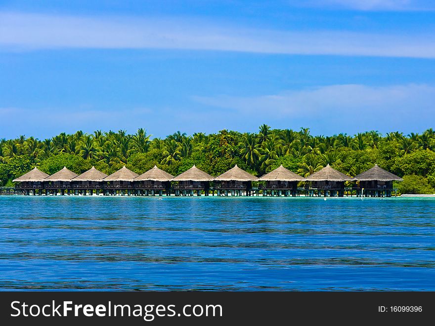 Water Bungalows On A Tropical Island
