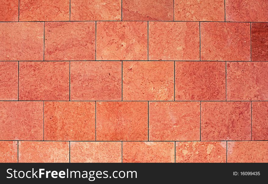 Wall with large red tiles. Wall with large red tiles