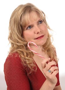 Woman With Candy Cane Royalty Free Stock Photos Woman With Candy Cane Royalty Free Stock Photos